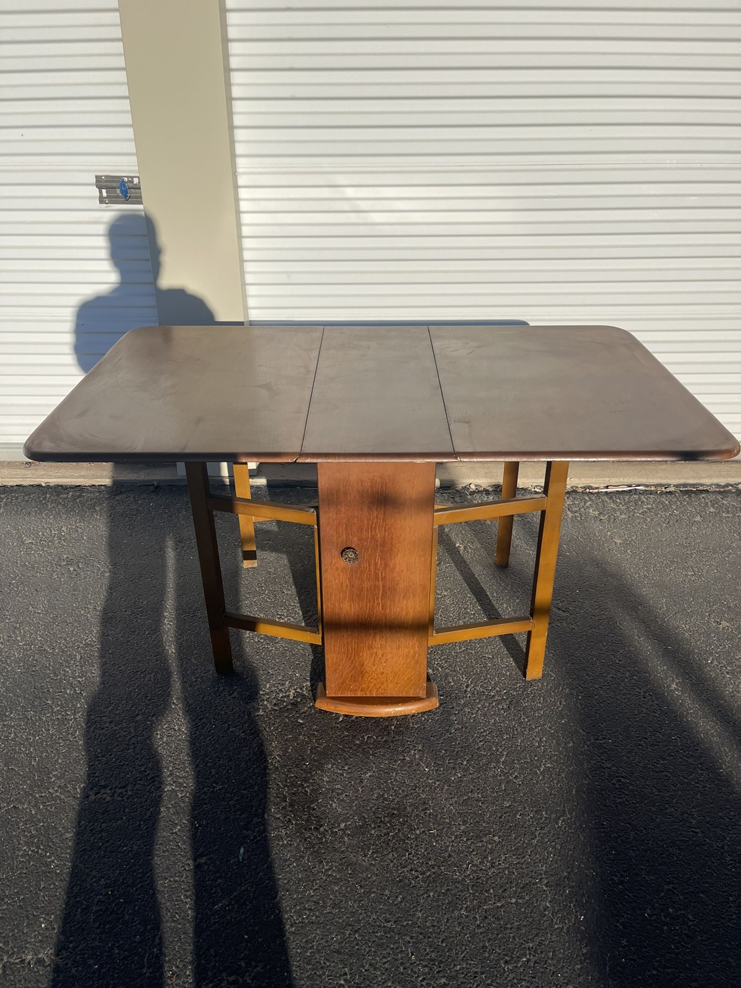Antique drop leaf table with two doors