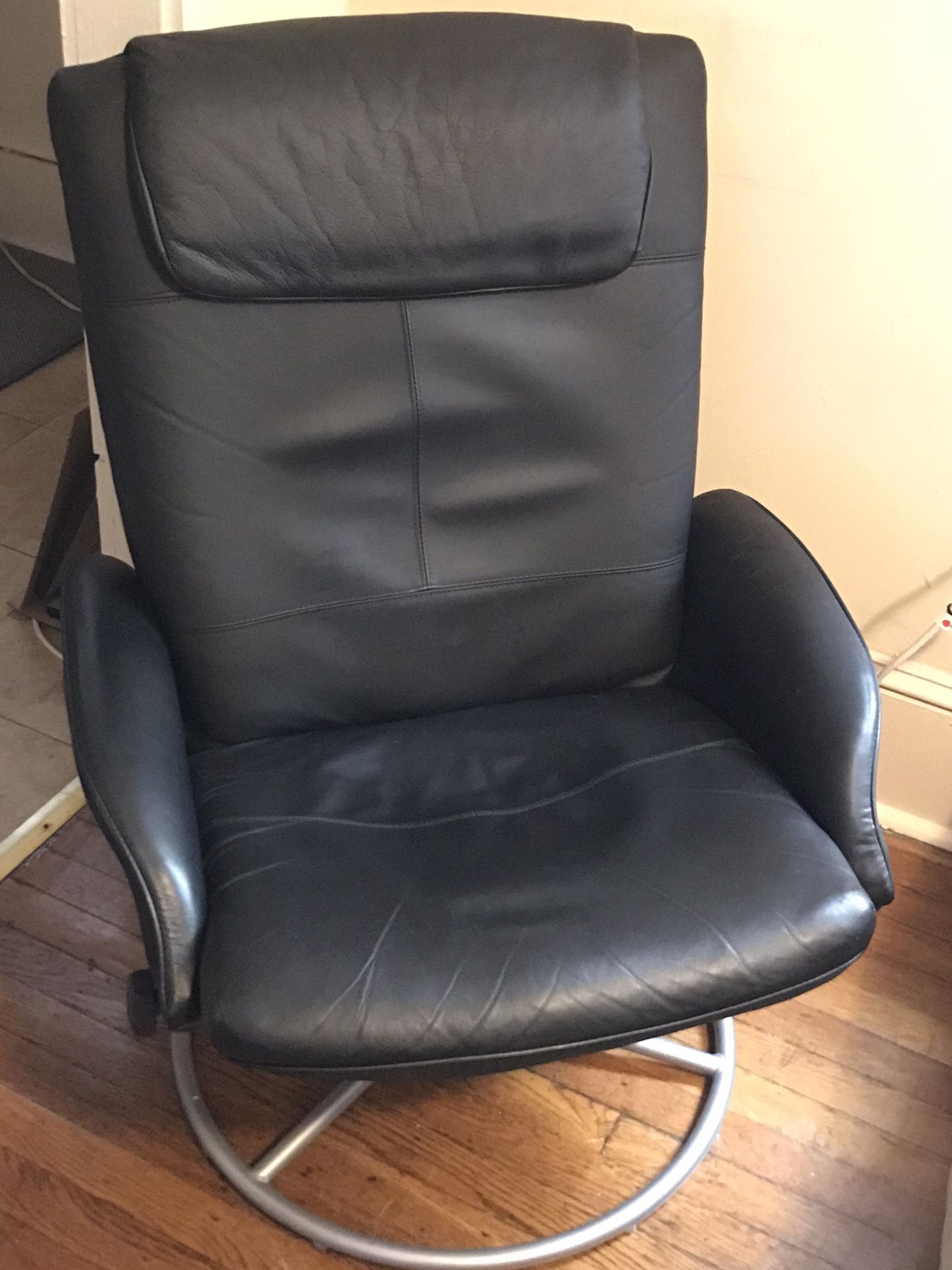 Leather reclining swivel-chair