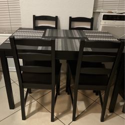 Small black dining room table