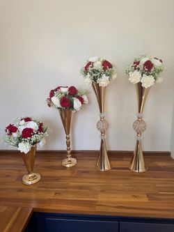 Selling (2) Trumpet Tall Vases- (2) smaller vases with artificial red, white floral.