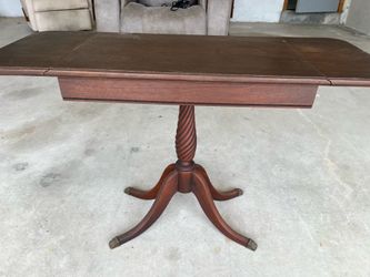 Antique drop leaf table with claw feet