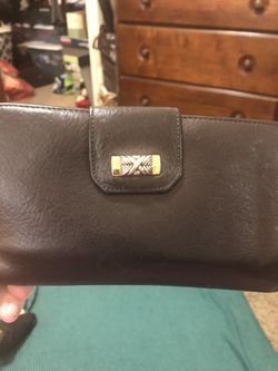 Dark brown leather wallet tons of different compartments