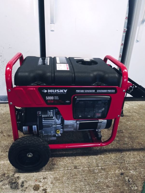 Husky 5,000watt portable generator with briggs & Stratton motor for