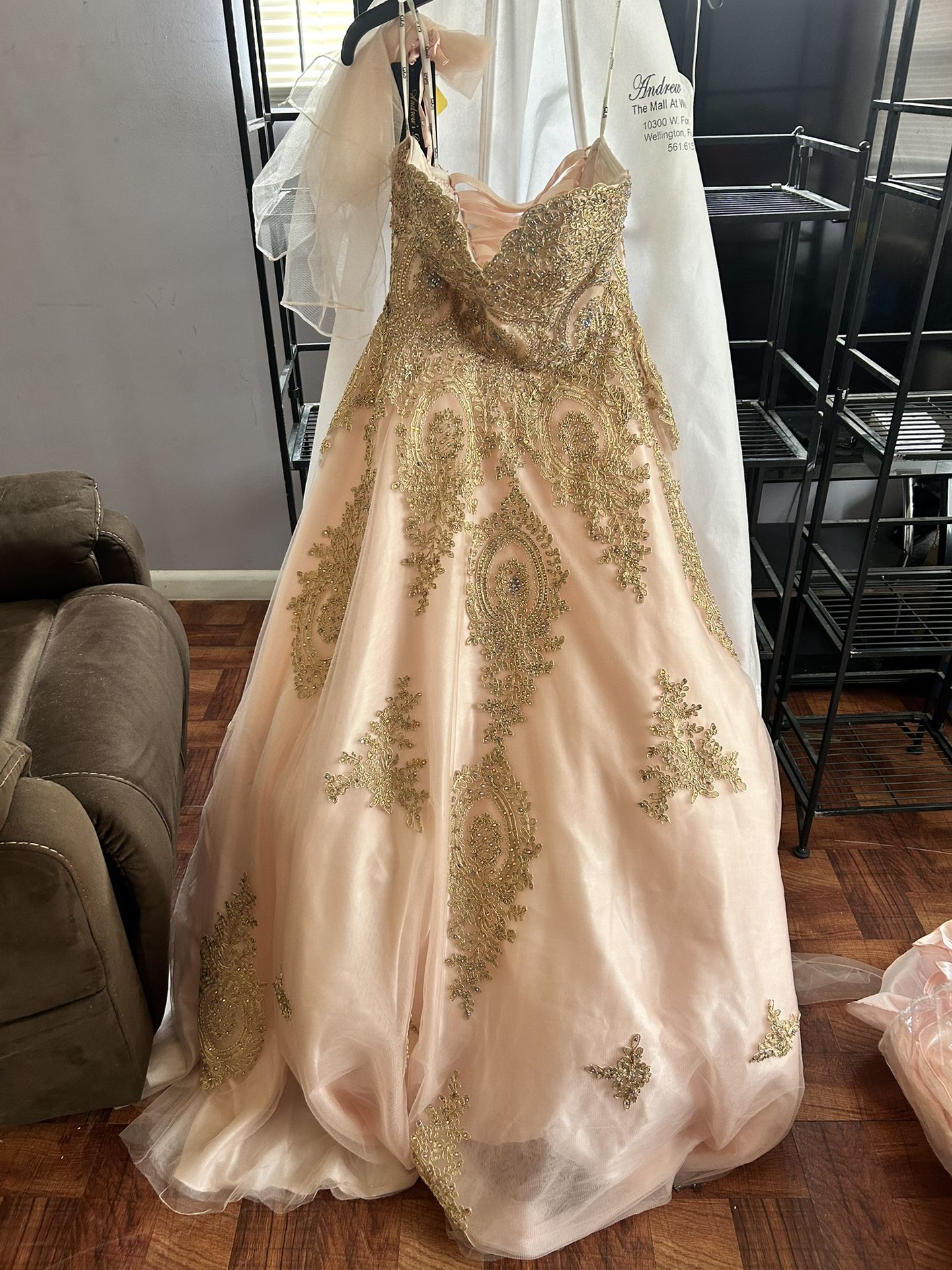 Light Pink And Gold Corseted Quince Dresses With Petty Coat And Crown