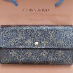 Louis Vuitton

Monogram Sarah Wallet, $250