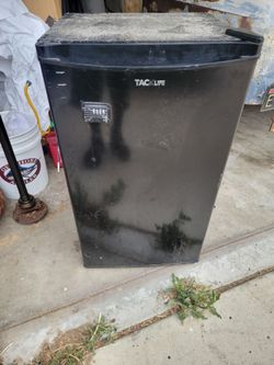 Mini fridge 33 inches high by 16 inches wide