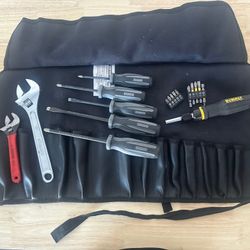 Tool roll with assorted wrenches and screwdrivers