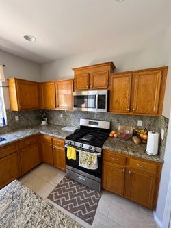 Kitchen Cabinets and island granite countertop