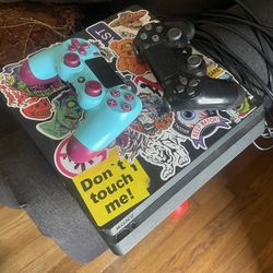 PS4 With Controller, Power Cord, And HDMI Cord*****Blue/purple Controller Not Included****