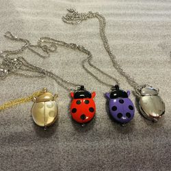 *LADYBUG* NECKLACE WATCHES - $12 each  THE PURPLE ONE HAS SOLD