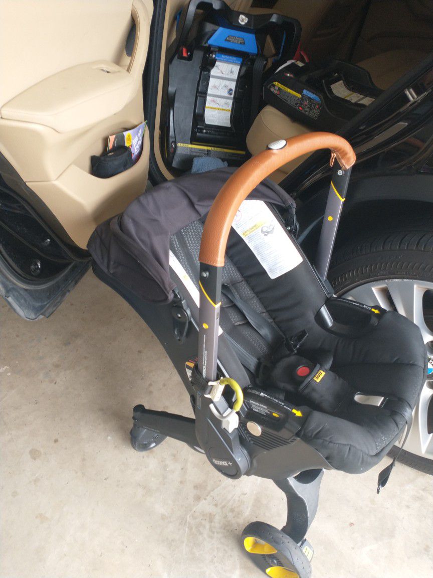 Doona Car Seat Stroller And Two Bases 