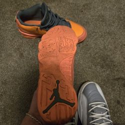Bright Orange Jordan 9s Low 