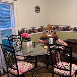 Glass Table & Metal Chairs 