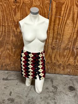 white plastic female mannequin torso. Used in good condition with some  cosmetic blemishes. These blemishes are in the form of some  scratches and scu