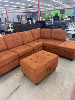 Brand New Orange Sectional With Storage Ottoman 