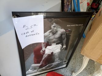 Ali poster with certificate