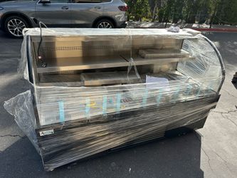 Horizontal open air merchandiser