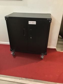 Rolling black storage closet
