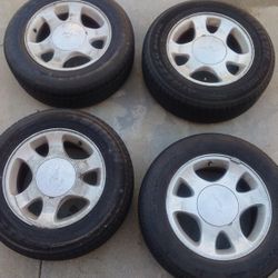 Set of 4 Mustang Tires & Rims 