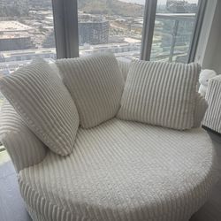 Signature Design by Ashley Lindyn Oversized Swivel Fabric Accent Chair in Ivory