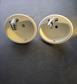two bathroom sinks with faucets $50