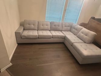 Large gray sectional sofa with chaise