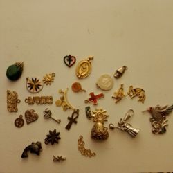 A Collection Of Assorted Pendants.