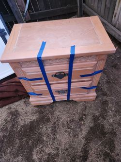 2 draw nite stand 24.5 tall/15deep 25.25 wide has painters tap to keep draws shut