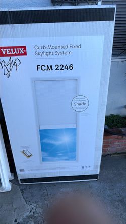 Curd mounted fixed skylight
