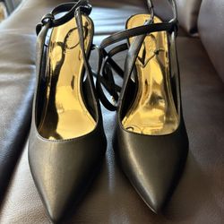 Black GUESS high heels with gold interior 