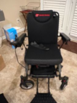 Brand New Electric Wheelchair Brand Travel Buggy That folds into a Suitcase for Easy Handling
