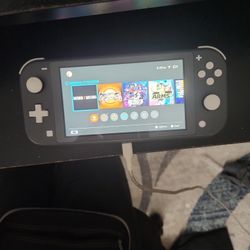 Nintendo Switch Lite With 7 Games