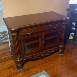 . Tv Cabinet wiyh pull out drawers and glass doors for TV