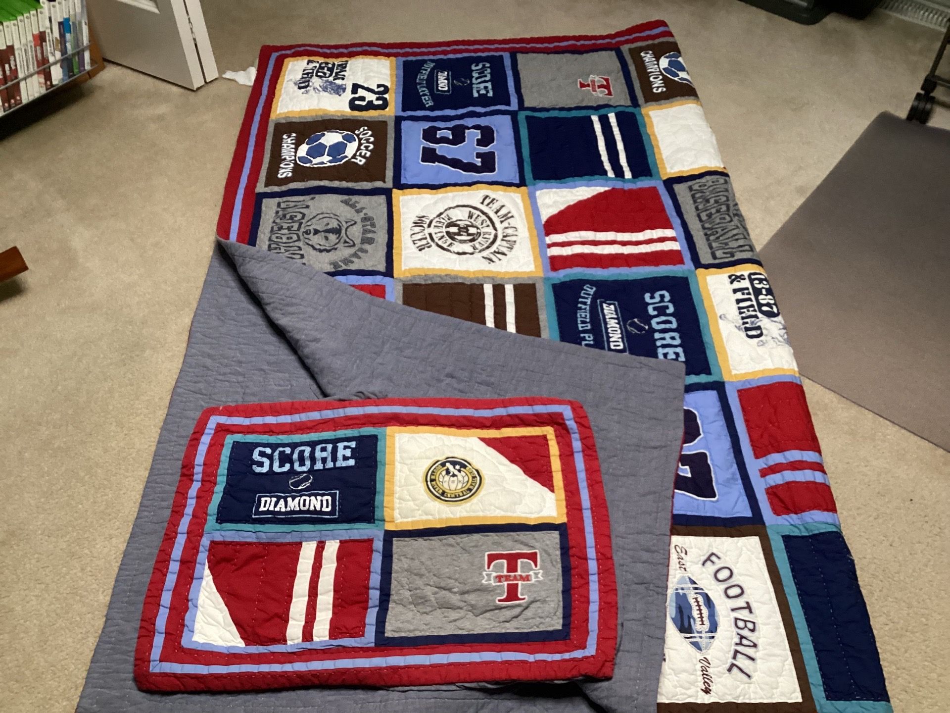 Twin sports theme quilt and sham