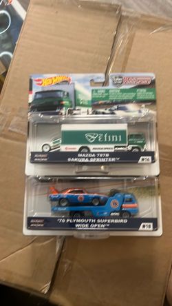 Hot Wheels, transporter 70s Plymouth super Bird and the Mazda 787B transporter