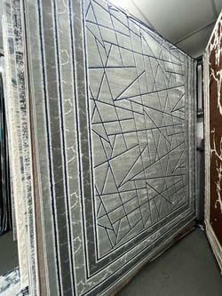 Large Gray Area Rug with Geometric Pattern