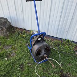 Cobra Drain Machine, Specifically a drum auger used for Heavy-Duty Drain Cleaning. 
