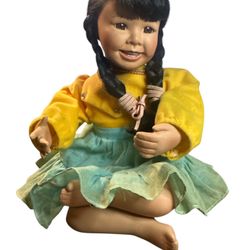 Porcelain doll The Ashton-Drake Galleries is a must-have for any collector or lover of dolls. The doll features intricate details and is designed to l