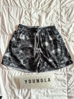 Young LA shorts size small. Reversible mesh. Skulls