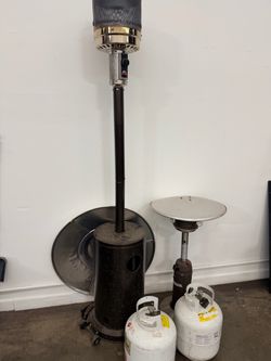 Outdoor space heaters with propane tanks