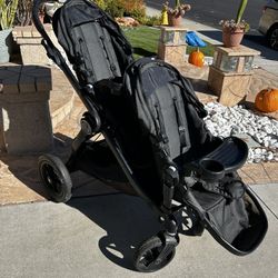 City Select Deluxe Double Stroller With Sunshades Large Under Basket 