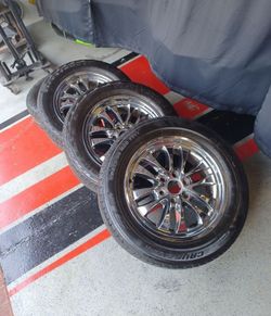 OEM Chevy, 6 bolt Chrome Tahoe, wheels and tires.