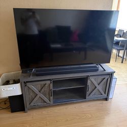 Samsung 75 in TV, Samsung sound bar and woofer and tv stand
