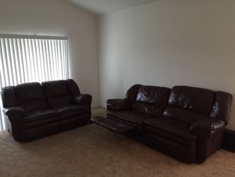 Brown leather reclining sofas