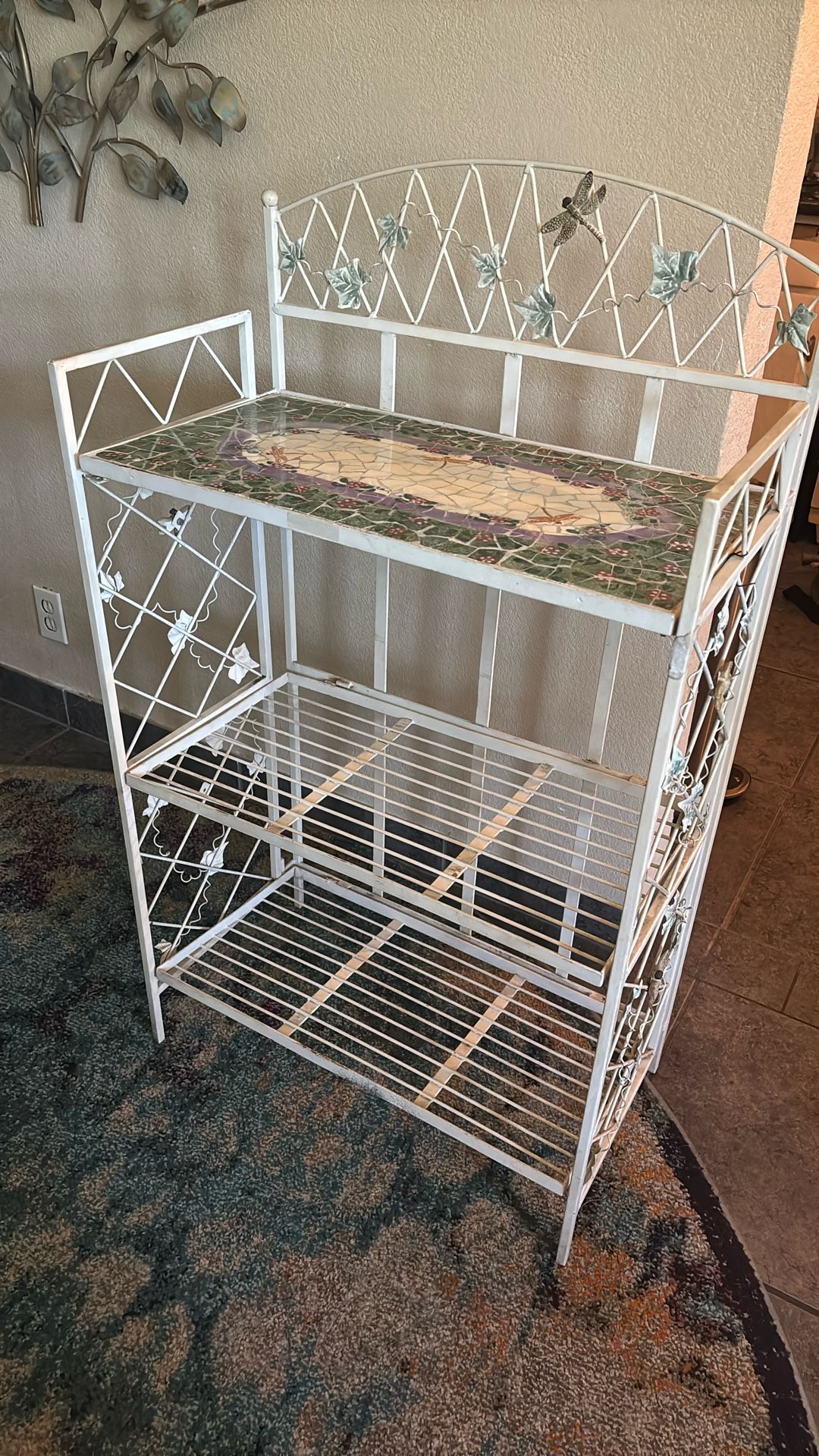 Rod iron shelf for plants