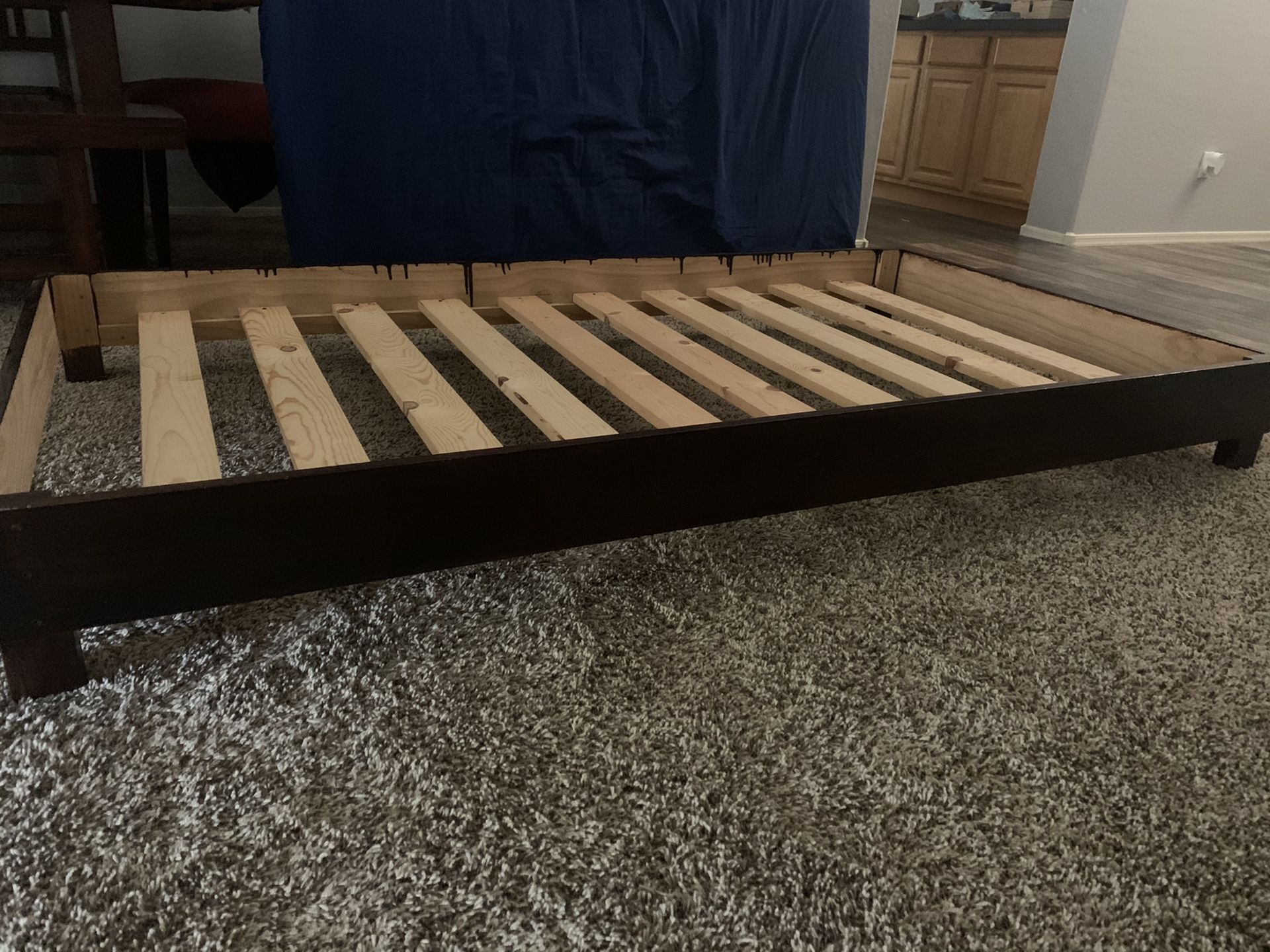 Twin size bed frame with mattress and mattress pad