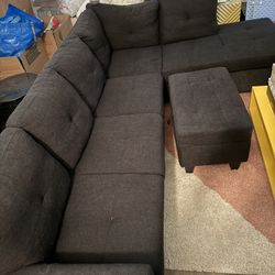 Black sectional Couch With Ottoman