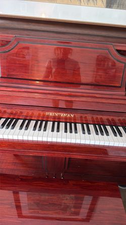 Heintzman solid wood stand up piano