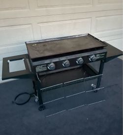 GRILL AND GRIDDLE PROPANE COOKING STATION (COMBO DE ASADOR Y PLANCHA)