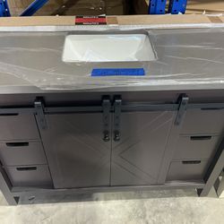 48” Bathroom Vanity in brown , single sink soft close solid wood with vanity top in white  $599  Luke’s liquidations warehouse Address:  2434 N Forsyt